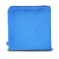 A blue mesh pouch on a black background.