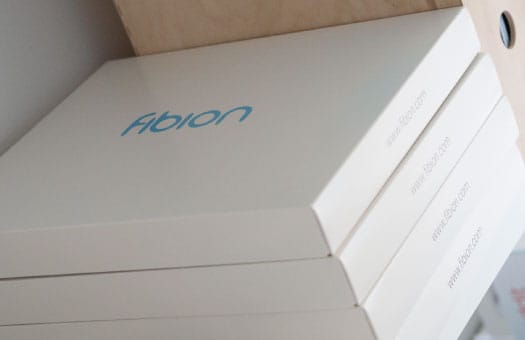 A white box with the word aflon sitting on top of it.
