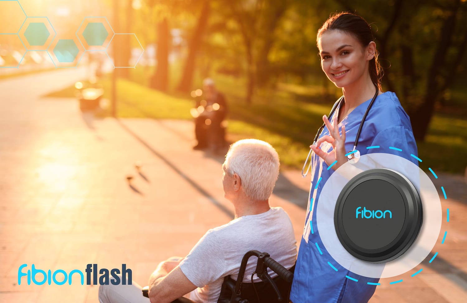 A nurse in scrubs gives an okay sign near an elderly man in a wheelchair outdoors, with a Fibion device shown for activity monitoring and the Fibionflash logo visible.