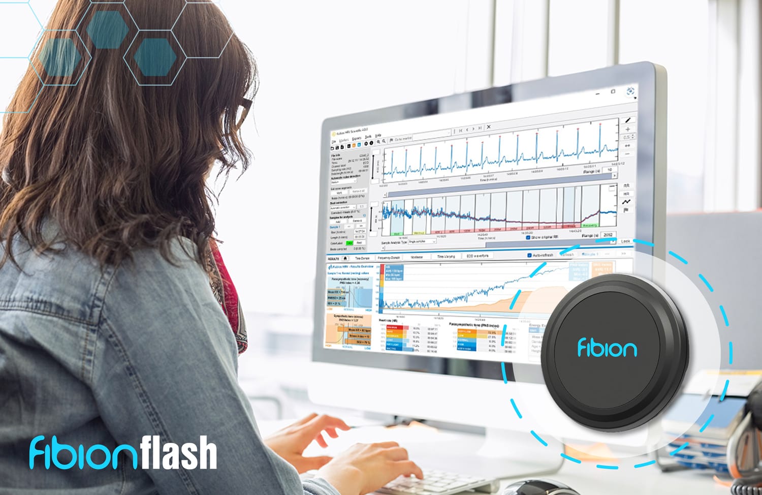 A person is analyzing data on a computer screen, displaying charts and graphs, with the Fibion device highlighted alongside an ECG Recorder App. The app seamlessly integrates with both Android and iOS, enhancing the depth of real-time health insights.