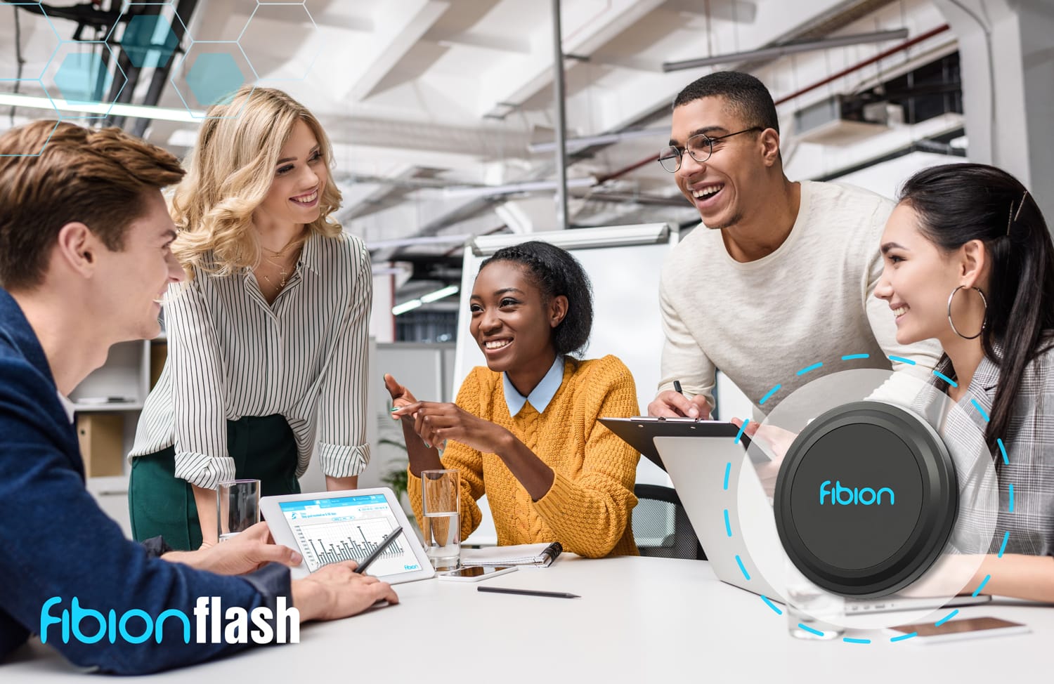 A group of five diverse people in a modern office setting is engaged in a discussion about the latest ECG Recorder App, with laptops and tablets open to Android and iOS projects. The "fibionflash" logo stands prominently in the foreground, capturing their innovative spirit.