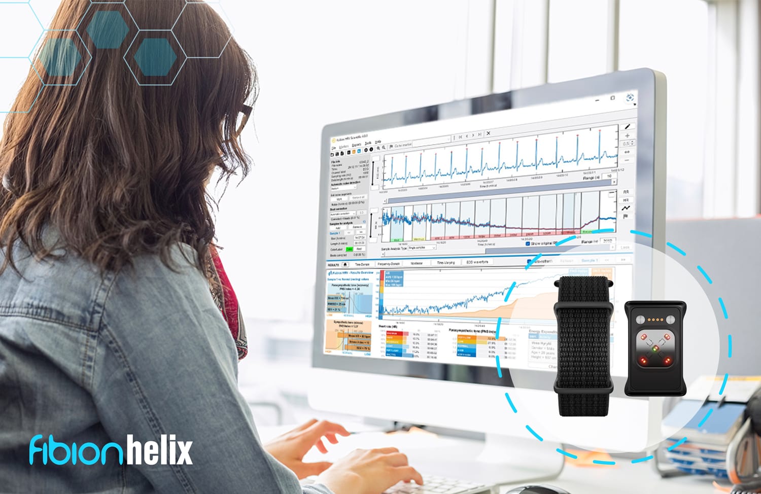 A person is analyzing data on a computer screen, filled with graphs and charts, while an Actigraphy Wristband rests beside them. Wearable devices are displayed nearby, marked by the "Fibion Helix" logo in the corner, indicating its use in large-scale studies.