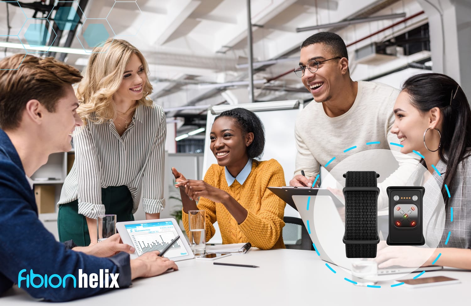 In an office setting, five people discuss and smile around a table with laptops and a chart. An inset highlights the Fibion Helix actigraphy wristband, underscoring its use in large-scale studies to monitor activity levels efficiently.