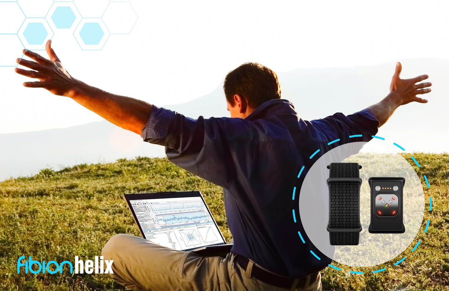 A person sits on a grassy field with a laptop, arms outstretched, embracing the freedom of outdoor research. An overlay showcases smartwatch strap design, emphasizing Fibion Helix features. Text: "fibion helix: where actigraphy meets innovation.