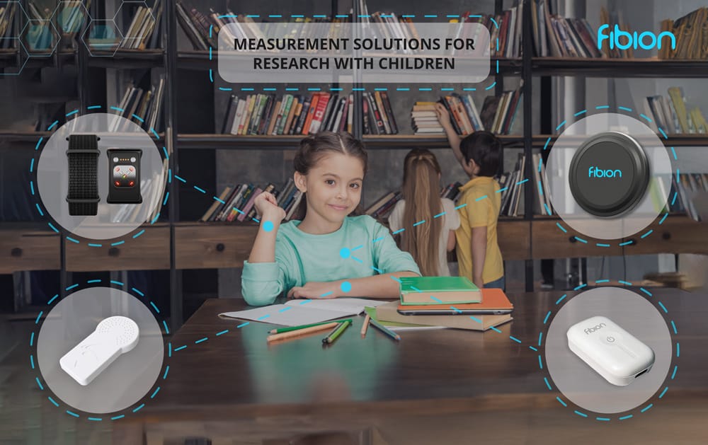 A child with a chronic illness sits at a table, immersed in notebooks and surrounded by icons of Fibion measurement devices, exploring a researcher's guide to physical activity within the quiet library setting.