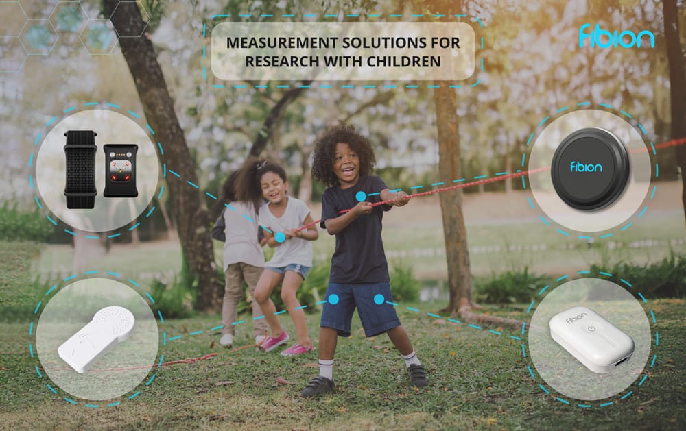 Children playing tug-of-war in a park. Overlay shows activity tracker icons and text: "Measurement Solutions for Research with Children.