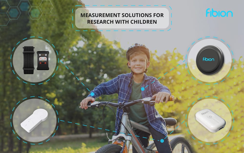 A child wearing a helmet sits on a bicycle in a park, embodying the spirit of a physical activity study. Surrounding graphics highlight wearable devices with the text "Measurement Solutions for Research with Children" and "Fibion," emphasizing planning for children and adolescents' health.